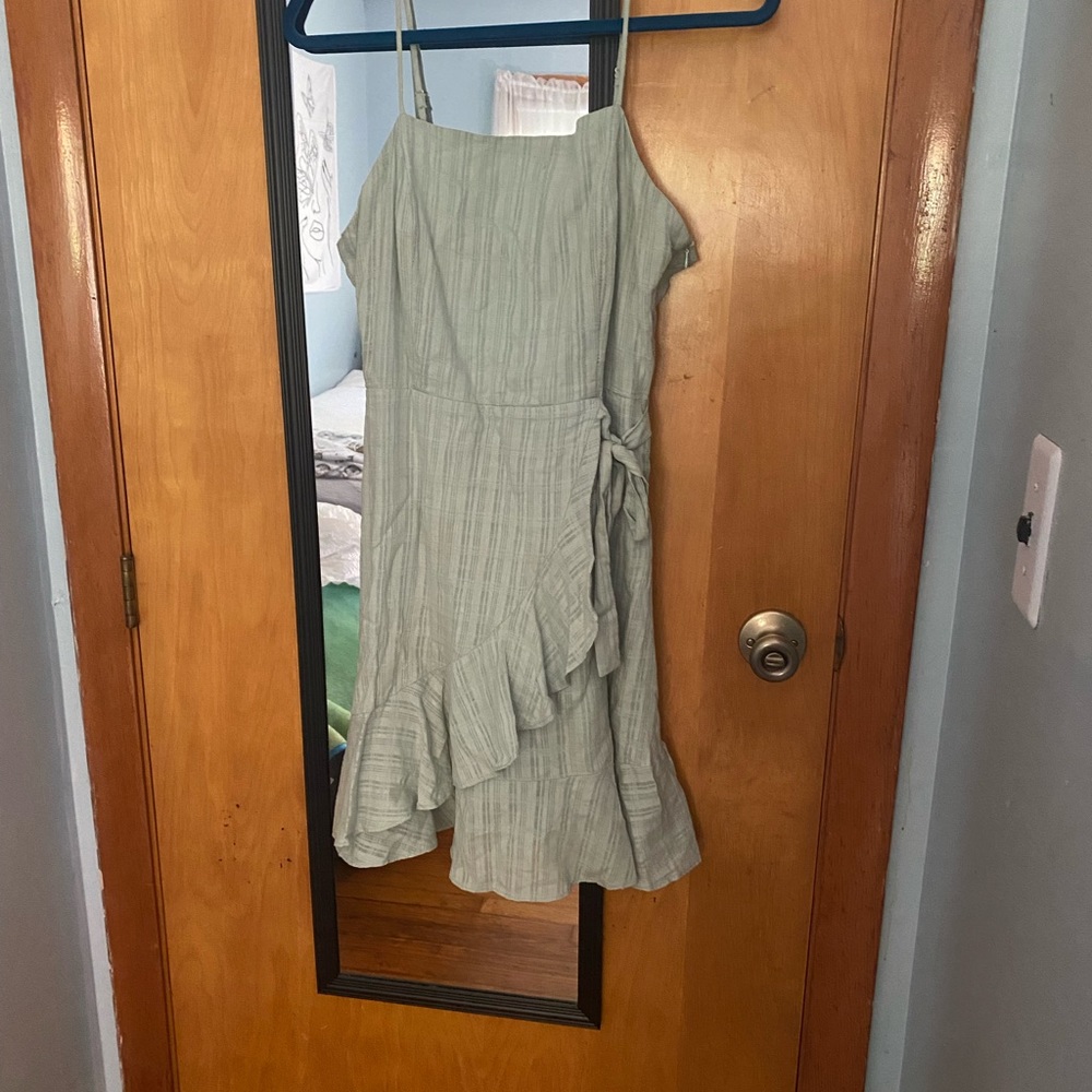 Cute short light green dress with spaghetti straps